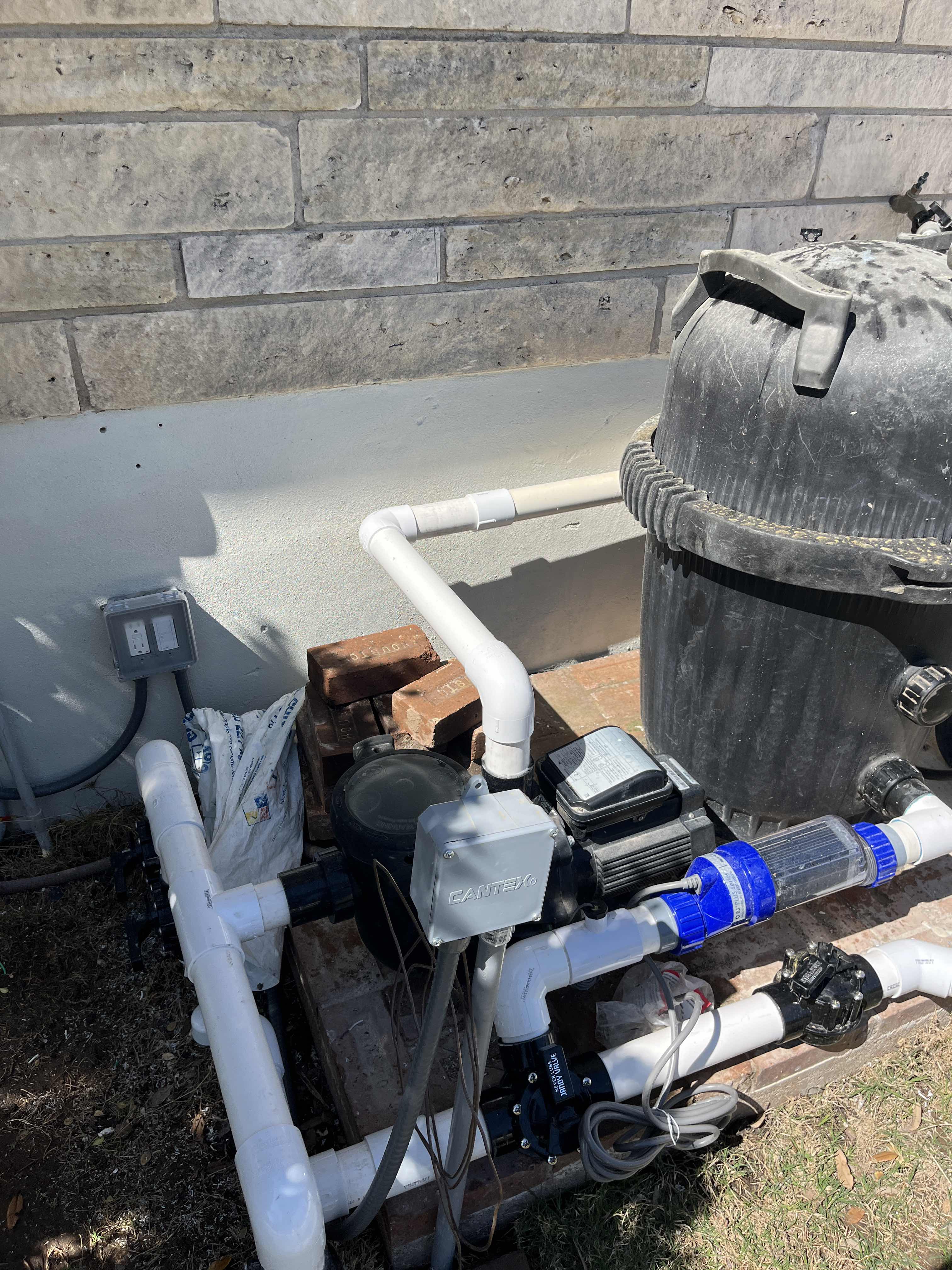 Pool pump and filter equipment pad during a repair and plumbing fix