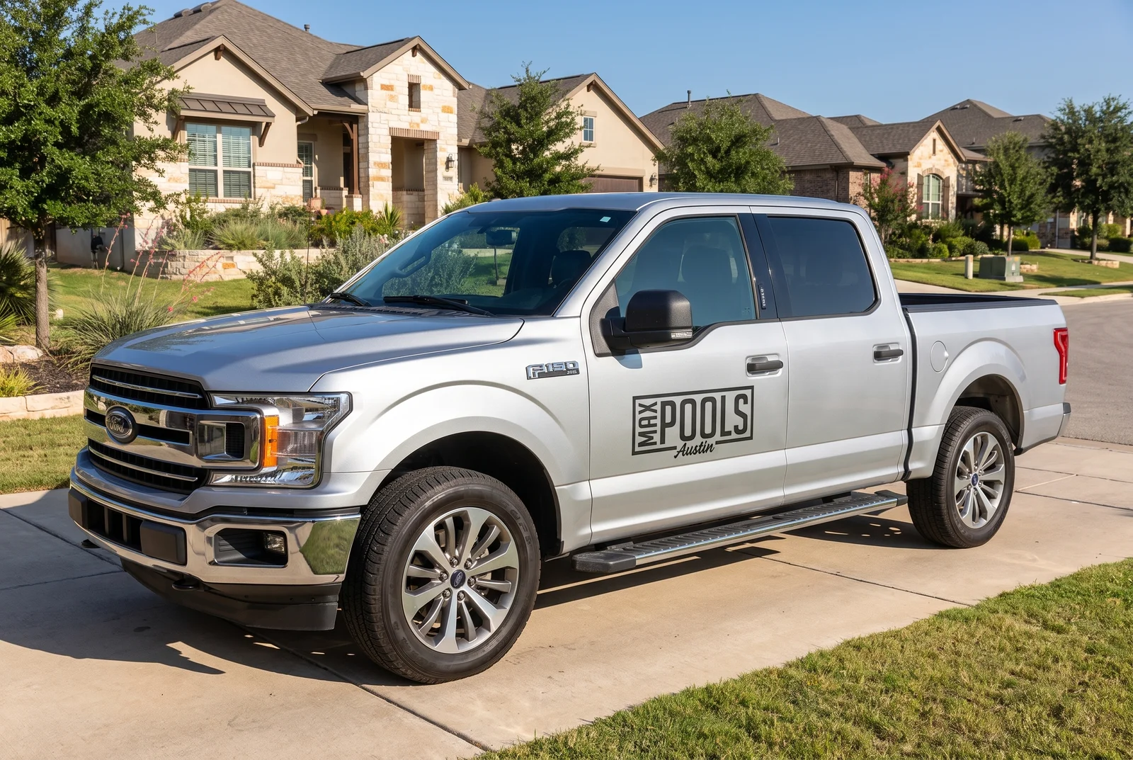 The Max Pools Austin branded truck parked in an Austin driveway
